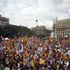 Chairs thrown in street on Spain's day of unity