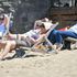 Sunseekers enjoy the hot weather on the beach at Weston-super-Mare
