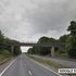 Man dies as car, police vehicle and ambulance collide