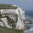 A couple stand on the top of the White Cliffs of Dover on April 26, 2018