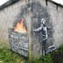 Artwork by street artist Banksy, which has appeared on a garage wall in Port Talbot