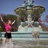 Zoe Beatson, 11, cools off in the Ross Fountain in Edinburgh's Princes Street Gardens
