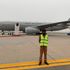 Pakistani security is seen on the tarmac in front of the Royal Air Force plane in Lahore, Pakistan, October 17, 2019. The Royal Air Force plane carrying the royal couple was forced to abort a landing in Islamabad twice on Thursday and return to Lahore after being caught in a severe thunderstorm. REUTERS/Peter Nicholls
