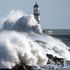 Waves crash against the pier wall at Seaham Lighthouse on the County Durham coast as weather warnings remain in owing to strong winds from Storm Atiyah.
