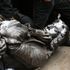 Protesters pull down a statue of Edward Colston during a Black Lives Matter protest rally in College Green, Bristol