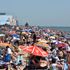 SOUTHEND-ON-SEA, ENGLAND - JUNE 25: A general view of crowds on the beach on June 25, 2020 in Southend-on-Sea, England. The UK is experiencing a summer heatwave, with temperatures in many parts of the country expected to rise above 30C and weather warnings in place for thunderstorms at the end of the week. (Photo by John Keeble/Getty Images)