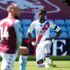 Crystal Palace's Wilfried Zaha takes a knee in in honour of Black Lives Matter movement during the Premier League match at Villa Park, Birmingham