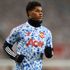 Manchester United's Marcus Rashford warming up before the Premier League match at Old Trafford, Manchester.