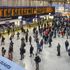 London, Feb 13, 2019: Many people in front of time board in rush hour at Waterloo train station, London, England.Waterloo station, a central London railway terminus