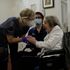 Care home resident Joan Potts, aged 102, has received a first dose of a COVID vaccine. Pic: AP