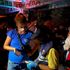 In this Tuesday, Jan. 26, 2021 photo, a Thai immigration officer talks to people at a bar on Koh Phangan island, Surat Thani province, southern Thailand. Police raided a party at a bar on a popular resort island in southern Thailand and arrested 89 foreigners for violating coronavirus regulations, officials said Wednesday. Pic: AP
