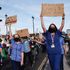National Health Service (NHS) staff wearing masks are seen protesting their exclusion from a recently-announced public sector pay rise, on Parliament Square. Around 900,000 public sector workers across the UK are set to receive above-inflation pay rise this year as a gratitude gesture from the Treasury for their efforts during the coronavirus pandemic. The pay rise is however exclusive of nurses and other front-line staff owing to a three-year pay deal they negotiated in 2018 which led them to m