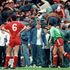 Liverpool goalkeeper Bruce Grobbelaar (r) and Alan Hansen (6) can only watch as the tragic events unfold around them. 96 people in total lost their lives after a crush occurred during the match.