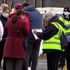 People queue for the vaccination centre at the Essa Academy in Bolton. The Indian coronavirus variant has been detected in a number of areas in England, including Bolton, which are reporting the highest rates of infection, data suggests. Picture date: Friday May 14, 2021.