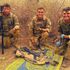 British troops battle sandstorm to seize Islamic State weapons cache