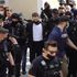Greek man in court wearing bulletproof vest as he is charged with murder of British wife