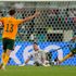 Wales' Aaron Ramsey, right, runs to celebrate after scoring the opening goal against Turkey in Baku