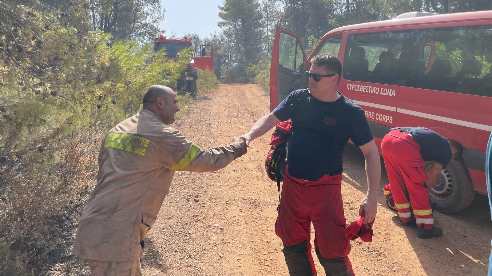 Greece wildfires: UK team help 'strained and exhausted' Greek colleagues battle forest flames - breaking news now Greece wildfires: UK team help 'strained and exhausted' Greek colleagues battle forest flames