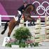 Tom McEwen from Great Britain on Toledo de Kerser in action