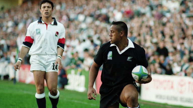 Jonah Lomu of New Zealand scores another try 