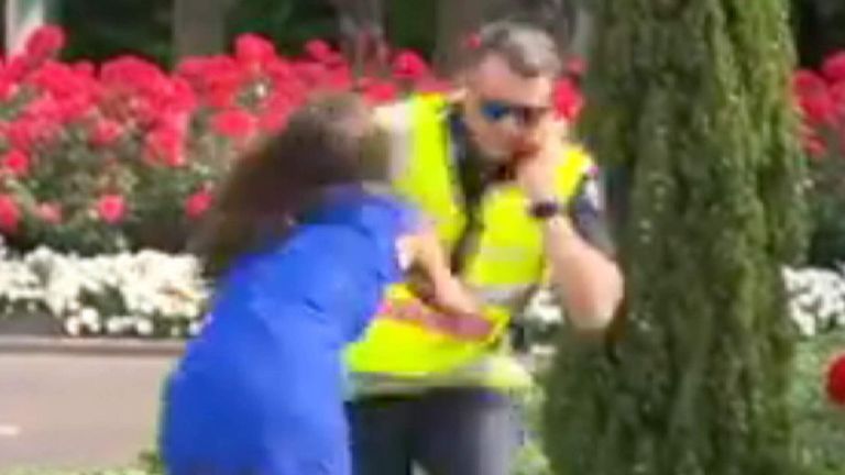 Watch Melbourne Cup Cop Pushed Into Flower Bed World News Sky News 