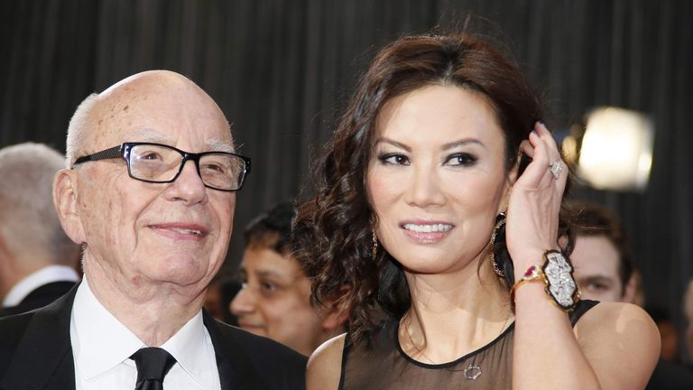 Rupert Murdoch, chairman and CEO of News Corporation, arrives with his wife Wendi Deng at the 85th Academy Awards in Hollywood, California