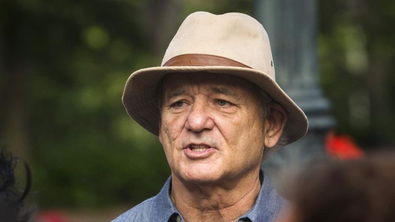 Actor Bill Murray takes part in a poetry reading and walk over the Brooklyn Bridge in New York