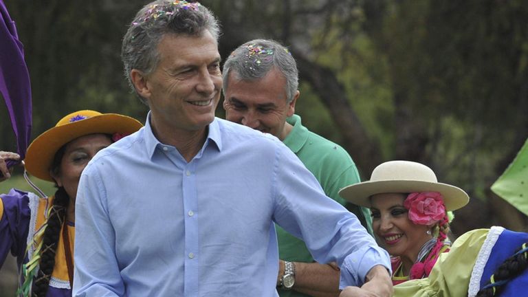 Argentina's President Macri dances as he takes part in a carnival celebration in the Argentine northern town of Purmamarca