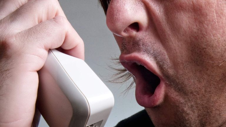A man screaming on the phone