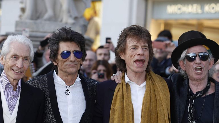 Members of the Rolling Stones arrive for the "Exhibitionism" opening