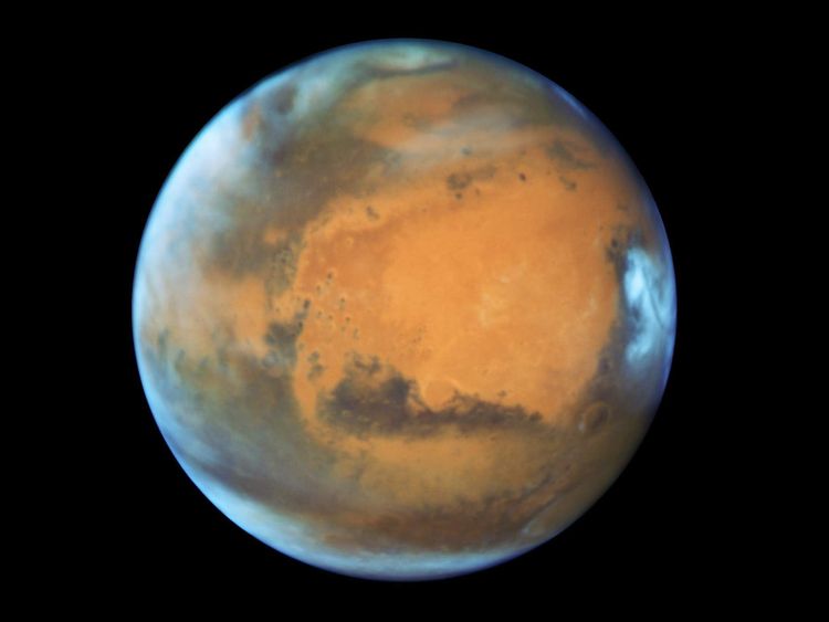 The planet Mars taken by the NASA Hubble Space Telescope when the planet was 50 million miles from Earth