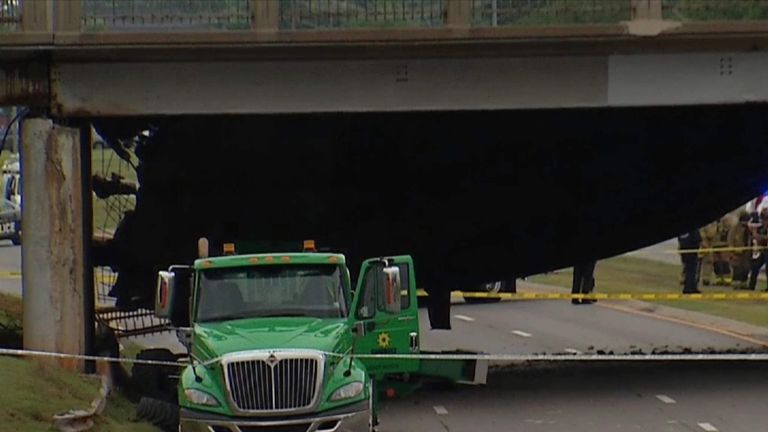 truck drives off overpass