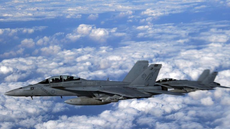 US Navy F/A-18 Super Hornets are seen fro