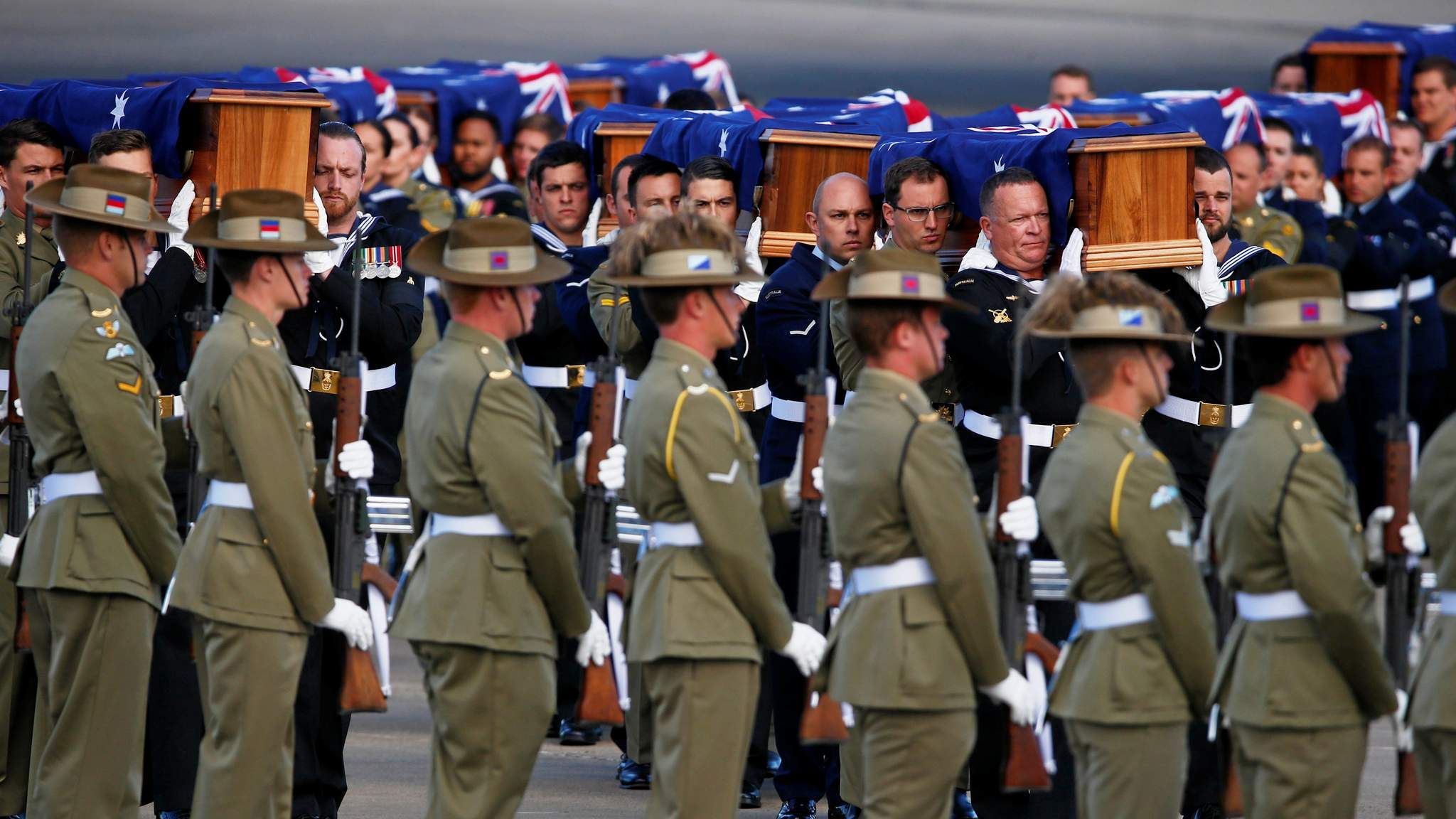 Soldiers' Remains Returned Home After 50 Years | World News | Sky News