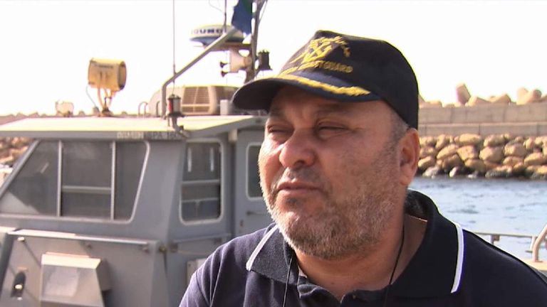 Libyan coastguard's head of operations Colonel Tawfik Alskir talking to Alex Rossi