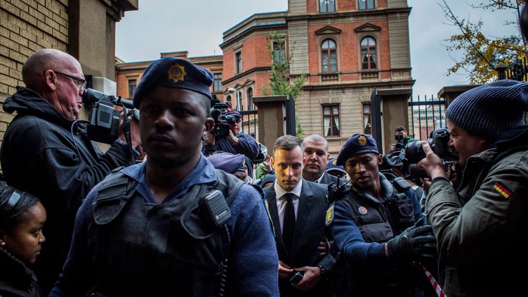 Oscar Pistorius arriving at court in Pretoria with tight security