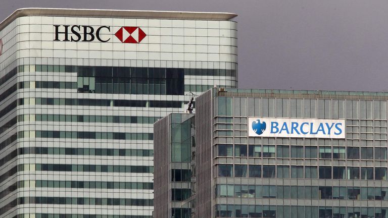 The HSBC and the Barclays buildings are seen in the Canary Wharf