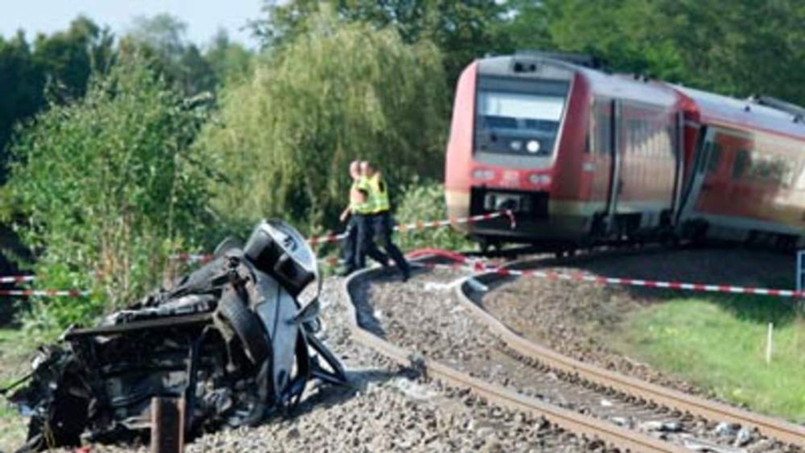 Dozens Injured As Train Smashes Into Car | World News | Sky News