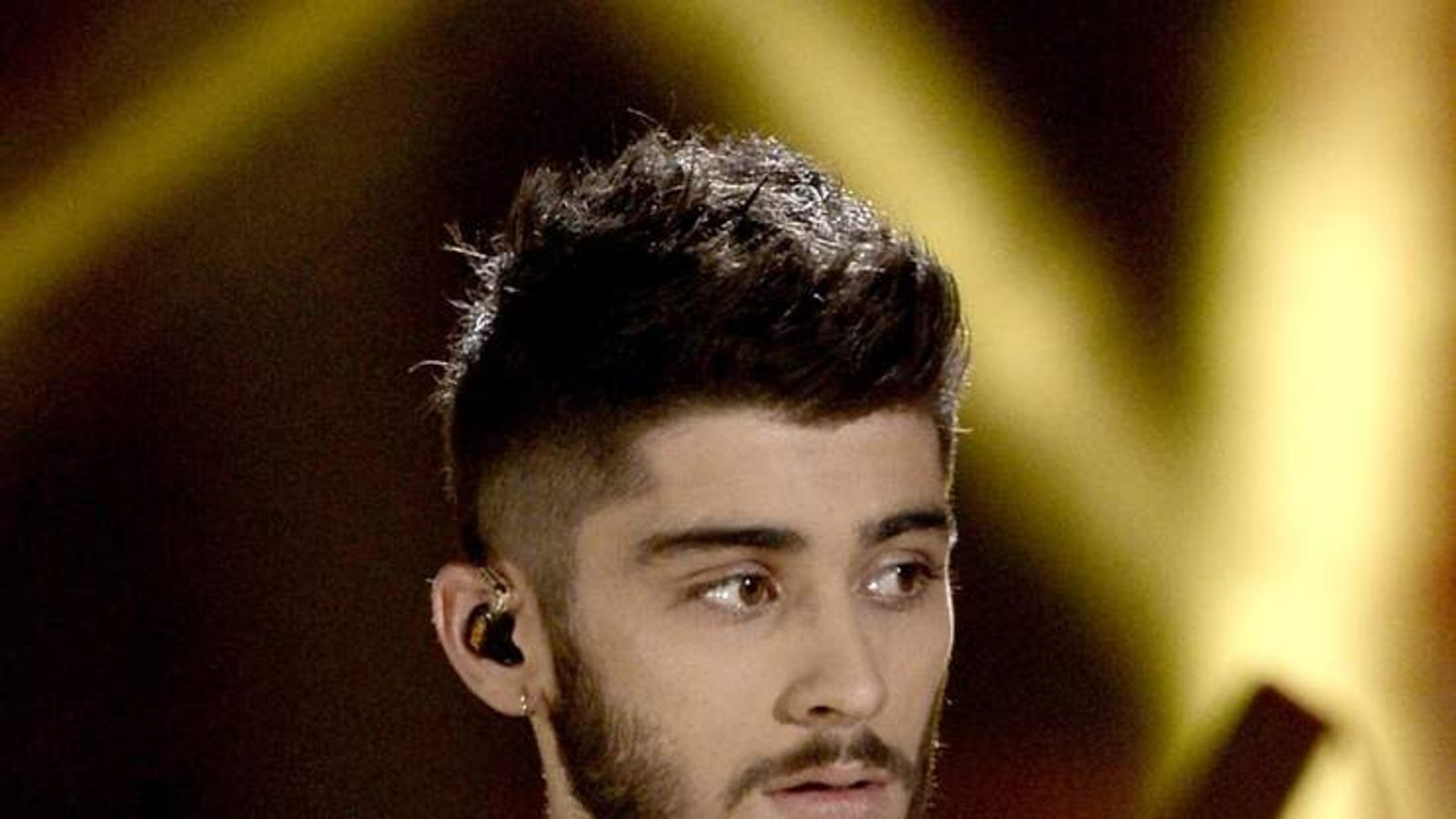Zayn Malik sports new hairdo in first appearance since quitting One  Direction | Irish Independent