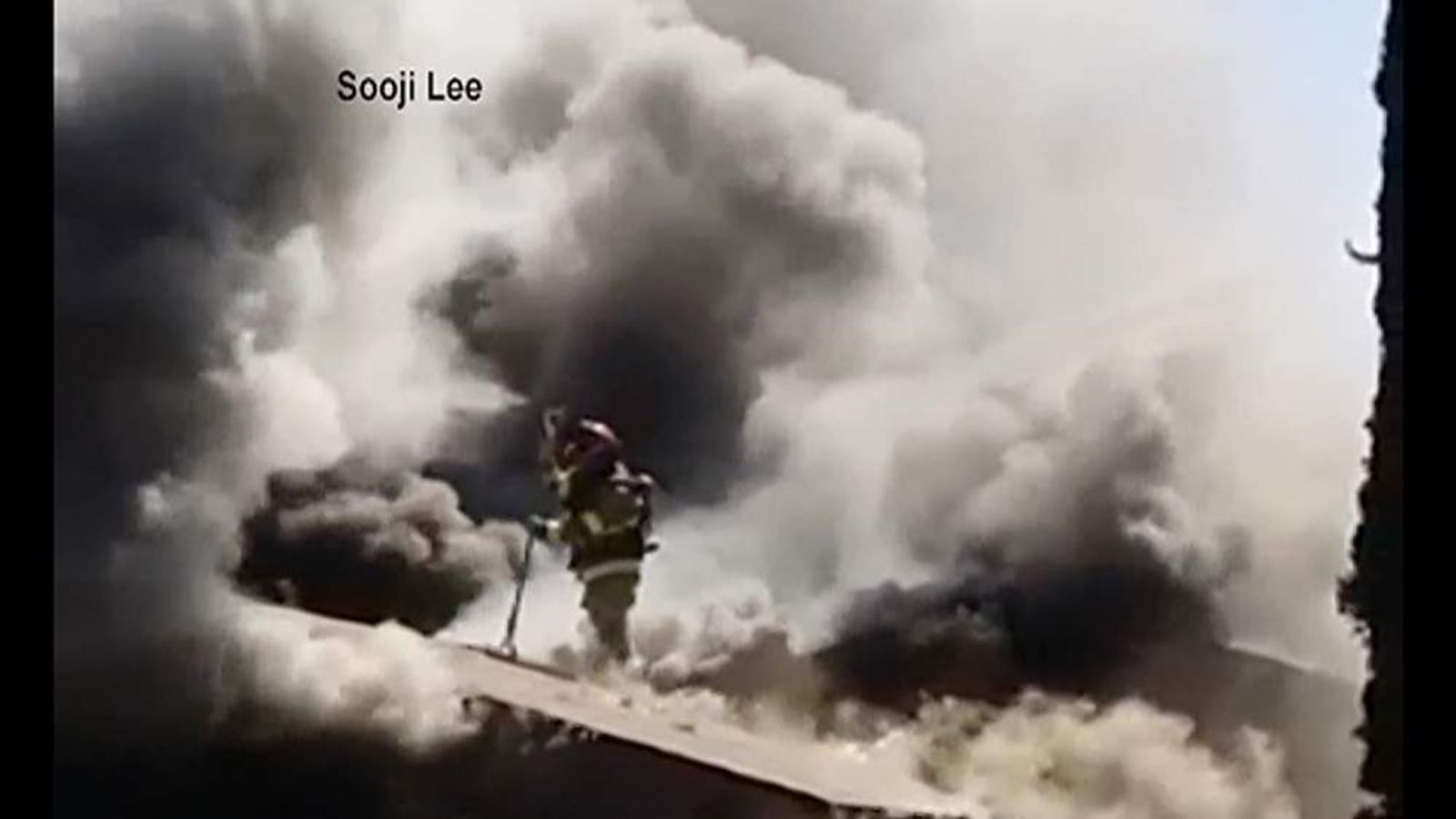 Video: Firefighter Falls Through Burning Roof | US News | Sky News