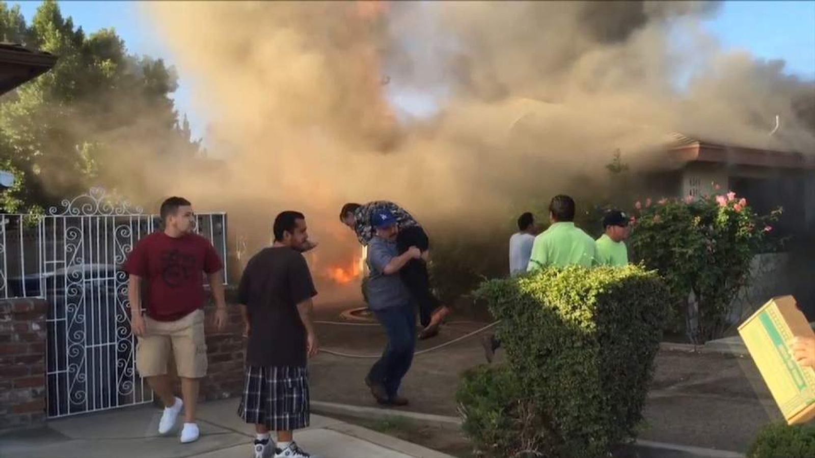 Man hailed hero after rescuing stranger from burning house in
