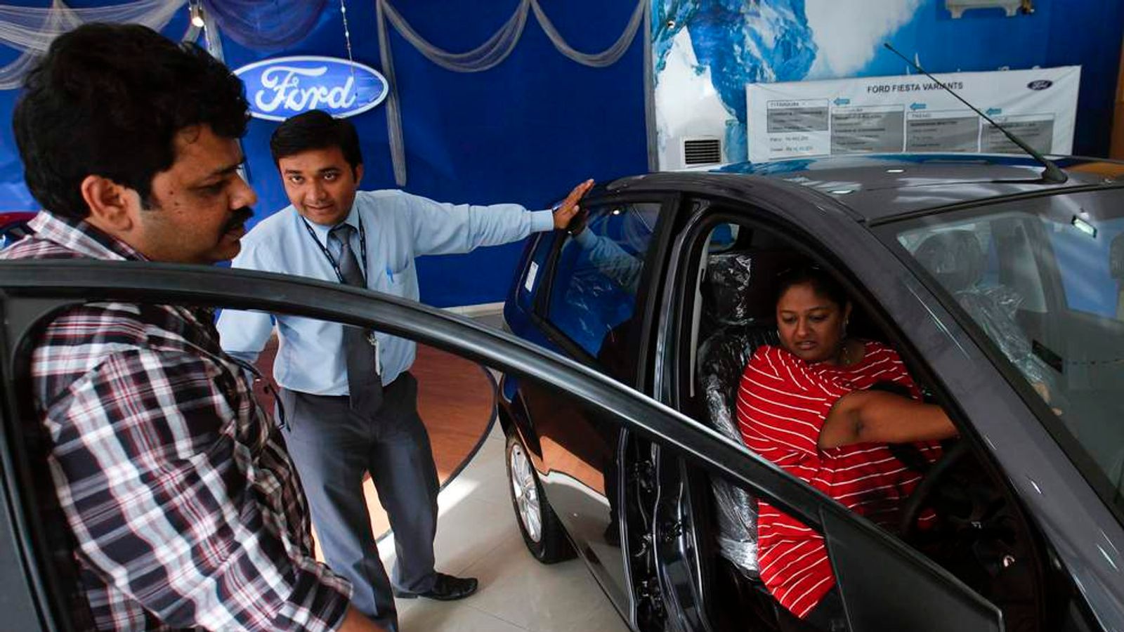 India Car Ads Ford Sorry Over Women In Boot World News Sky News