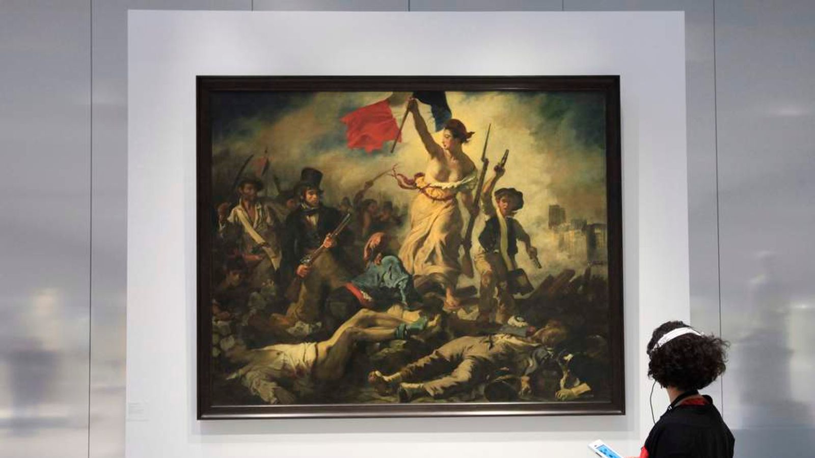 Woman Vandalises Louvre Delacroix Painting Ents Arts News Woman Vandalises Louvre Delacroix Painting Ents Arts News