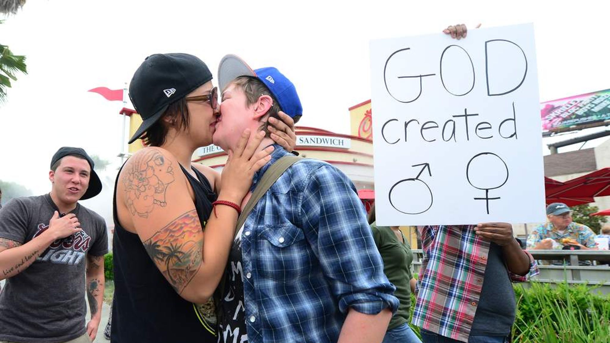 Gay Kissing Protests Outside Chick Fil A World News Sky News 9917