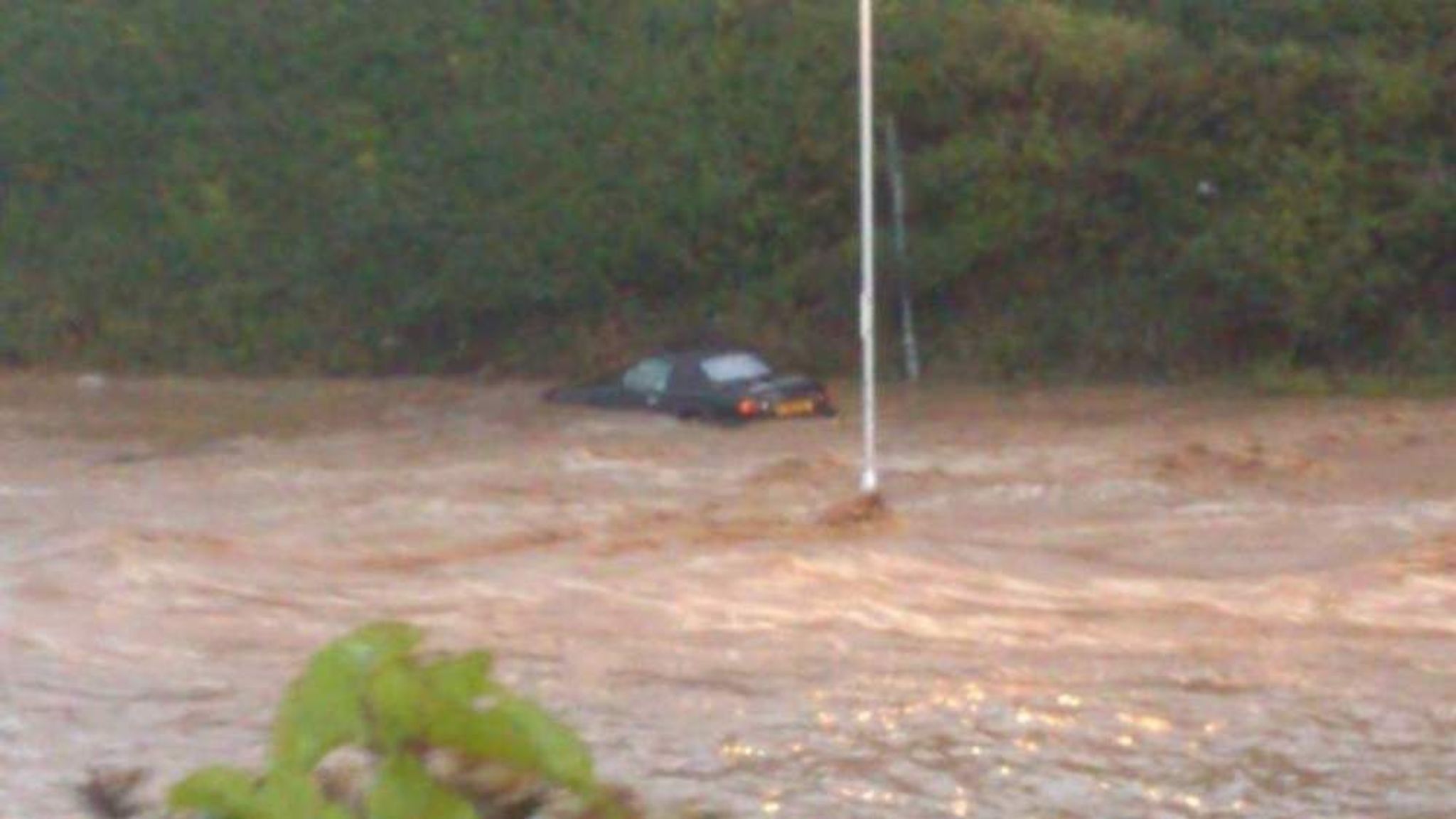 Flooding: Homes Evacuated And Cars Swept Away | UK News | Sky News