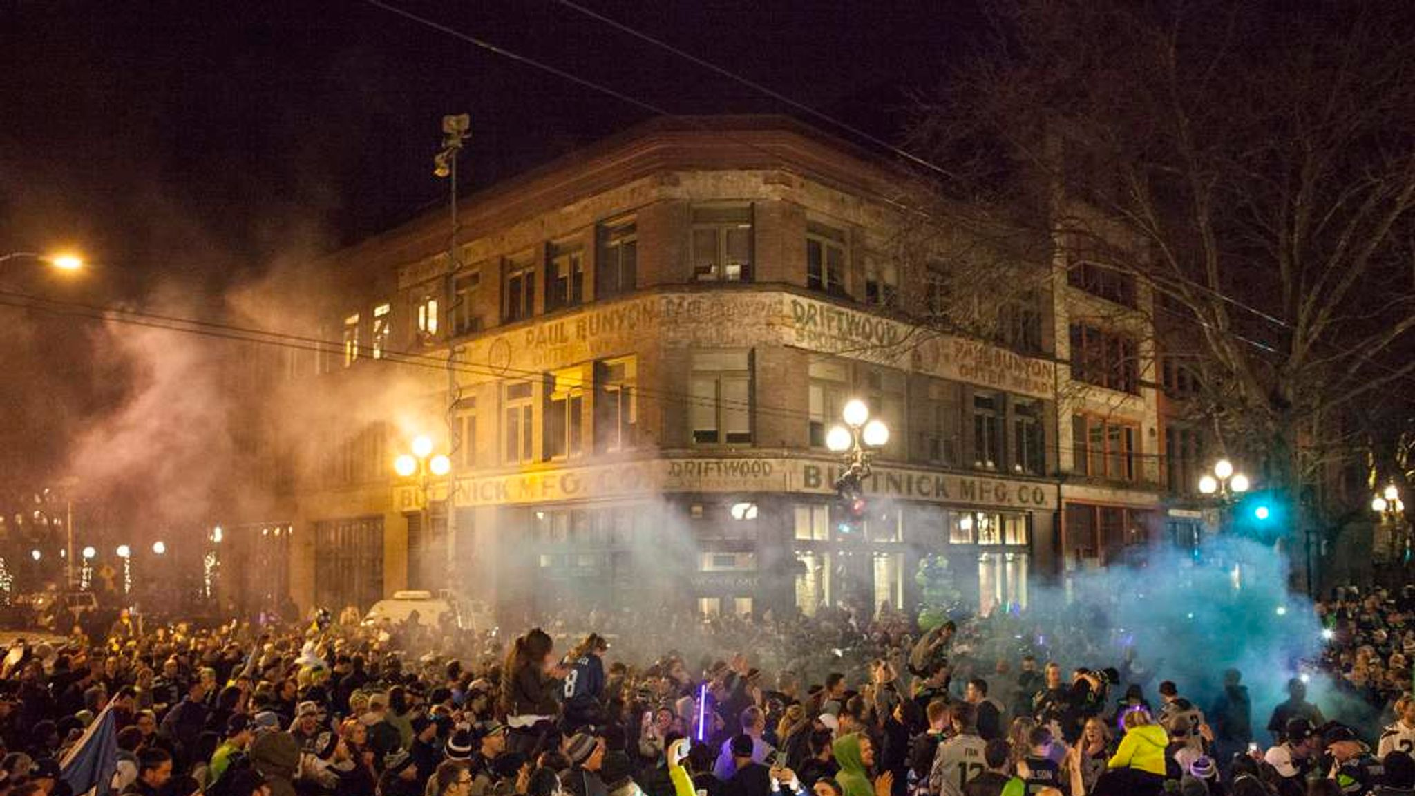 A group of Seattle Seahawks fans celebrate the win following the