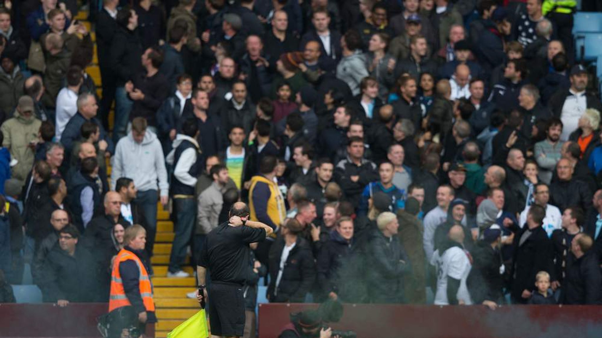 Linesman Hit By Flare During Spurs-Villa Match | UK News | Sky News