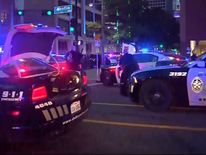 Police at the scene of the shootings in Dallas