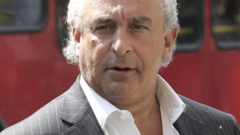Sir Philip Green stands outside Top Shop on Oxford Street