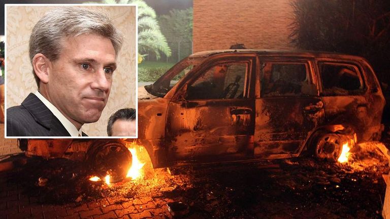 A vehicle sits smoldering in flames after being set on fire inside the US consulate compound in Benghazi late on September 11, 2012.